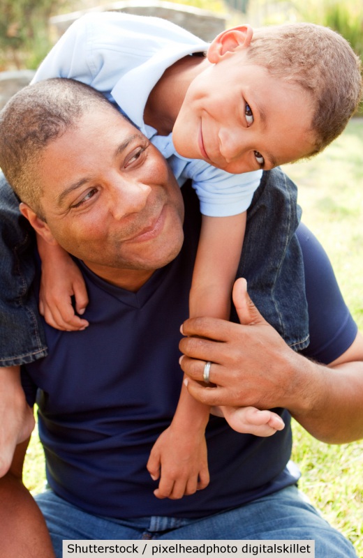 Happy child with his father | Shutterstock, pixelheadphoto digitalskillet 